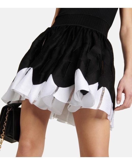 Alaïa Black Scalloped-trim Pleated-skirt Stretch-woven Mini Dress