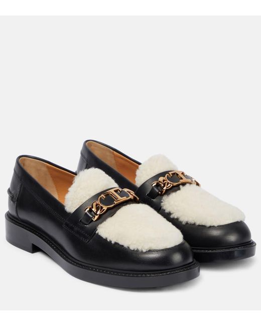 Tod's Black Leather And Shearling Loafers