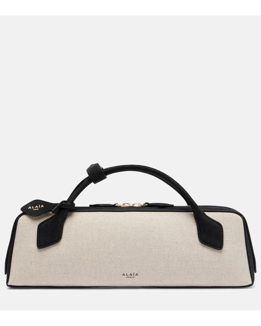 Clutch Le Teckel di Alaïa in Brown