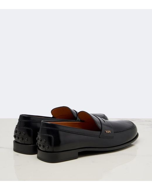Tod's Black Leather Penny Loafers