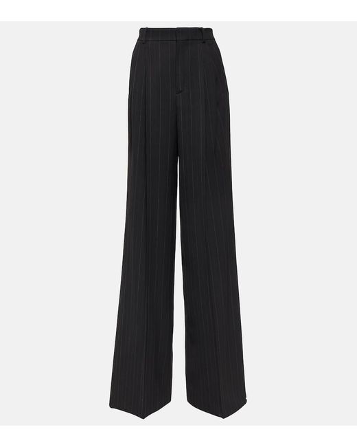 Pantaloni gessati a gamba larga in misto lana di Saint Laurent in Black