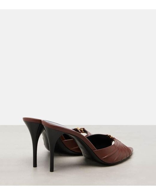 Mules Babylone Cassandre 90 En Cuir Saint Laurent en coloris Brown