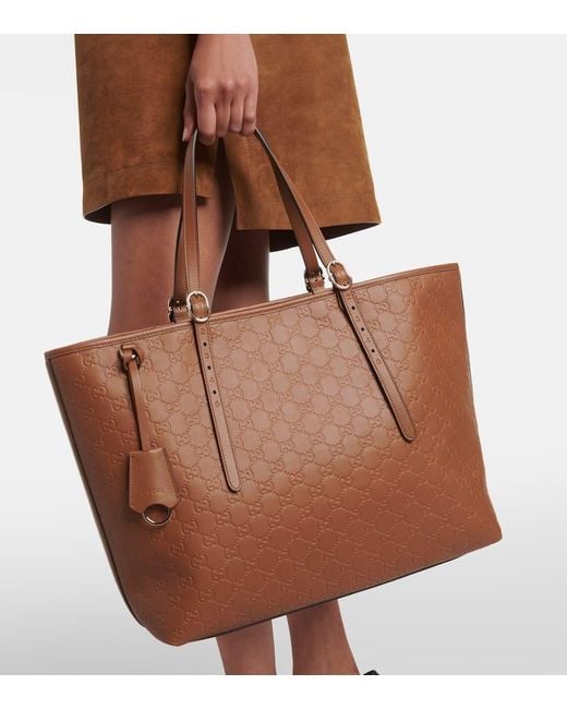 Gucci Brown Tote Bag Emblem Gg Aus Leder