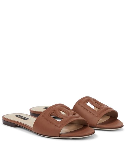 initials insignia cutout leather slides
