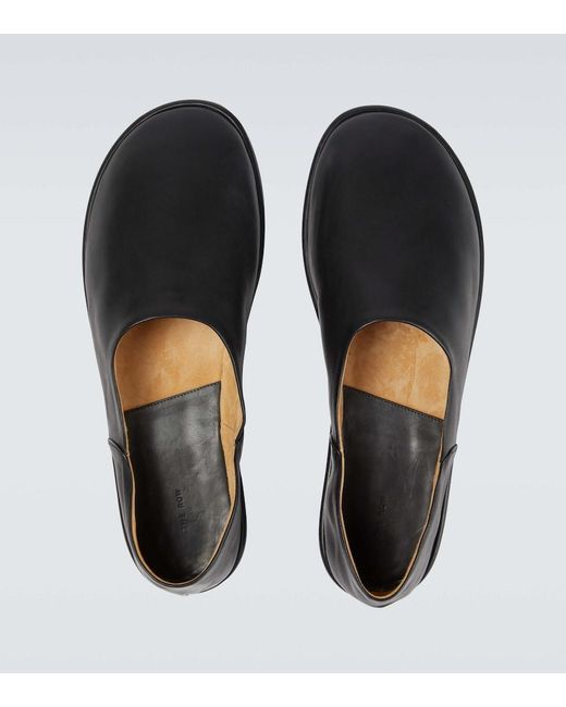The Row Black Canal Slip-On Leather Shoes for men