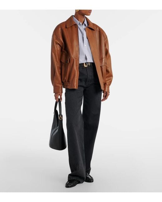 Mocassins En Cuir Verni Saint Laurent en coloris Black