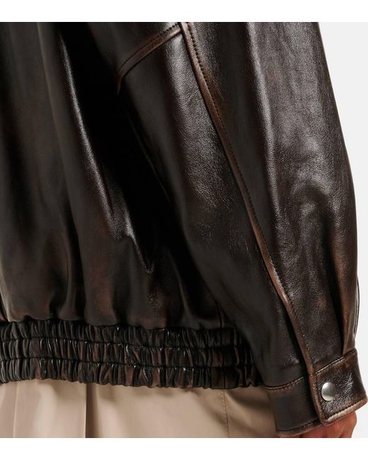 Veste En Cuir Et Shearling A Logo Miu Miu en coloris Black
