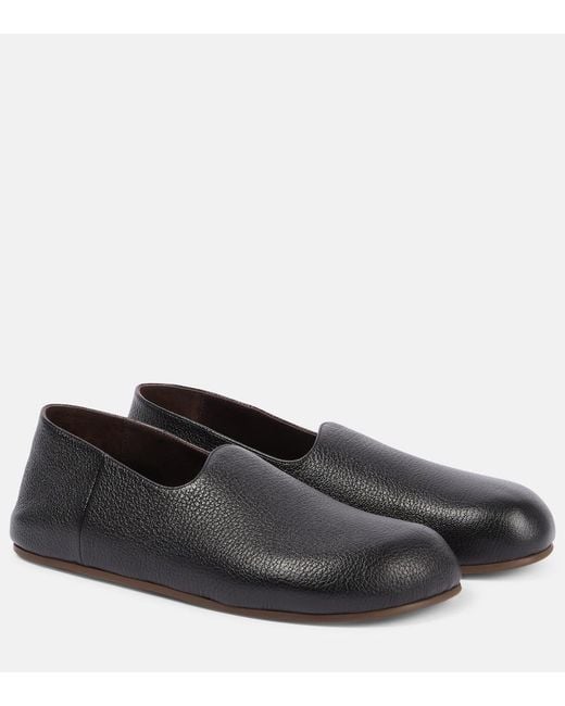 The Row Black Hugh Leather Slip-On Shoes