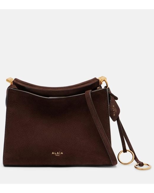 Sac Le Clic Small En Daim Alaïa en coloris Brown