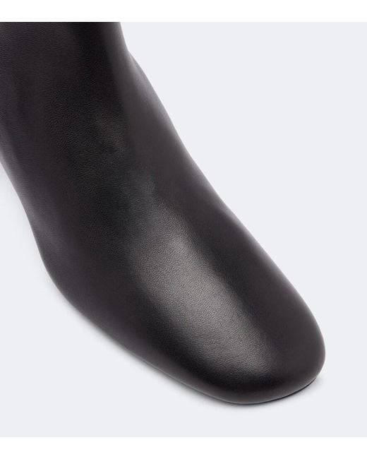 Totême Black Leather Ankle Boots