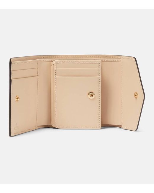Gucci Natural Medium GG Debossed Leather Wallet
