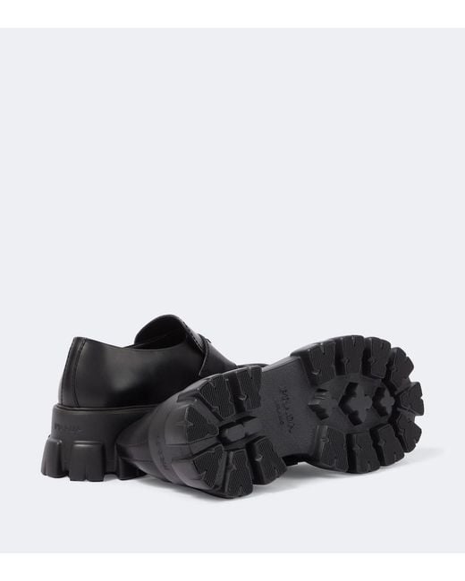 Prada Black Logo Leather Platform Loafers for men