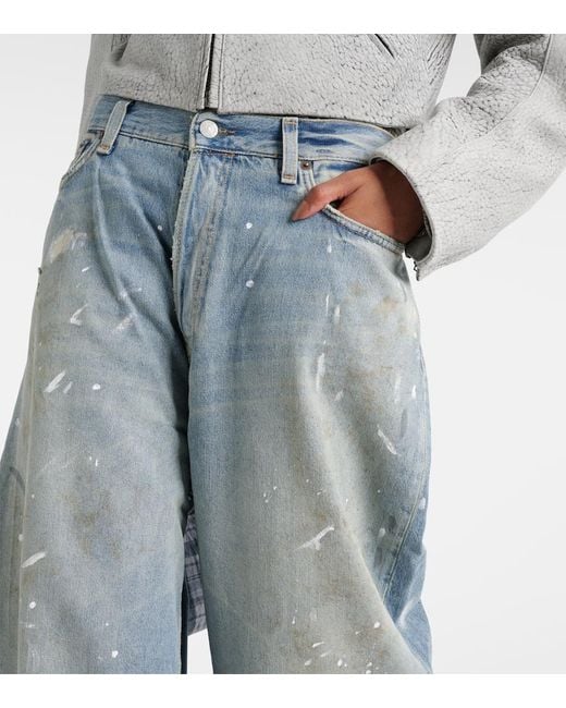 Jeans anchos desgastados de tiro medio Acne de color Blue