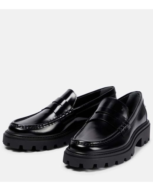 Tod's Black Schwarze Lederflache Slipper Für Damen