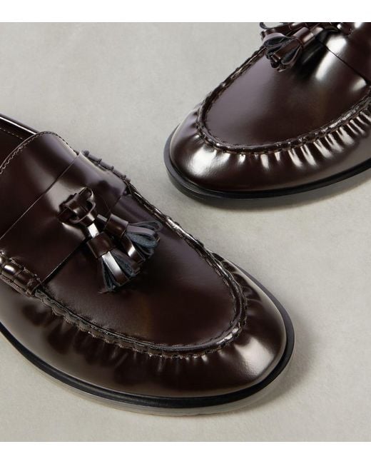 The Row Black Leather Penny Loafers