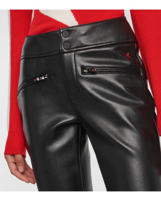 Pantalon evase en cuir synthetique Perfect Moment en coloris Black