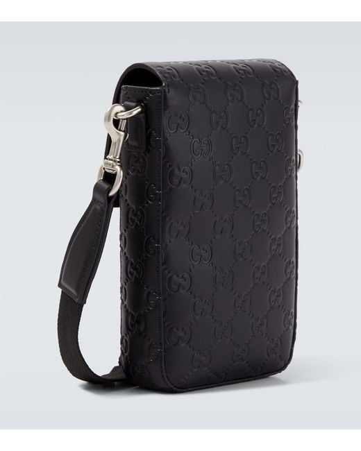 Gucci Black Gg Emblem Debossed Leather Phone Pouch for men