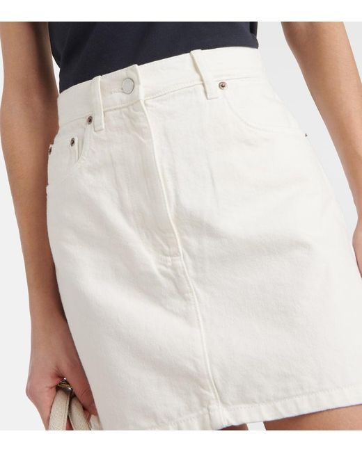 Minigonna di jeans a vita alta di Prada in White