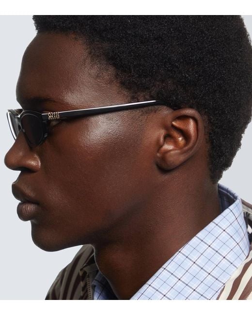 Miu Miu Ovale Sonnenbrille in Gray für Herren