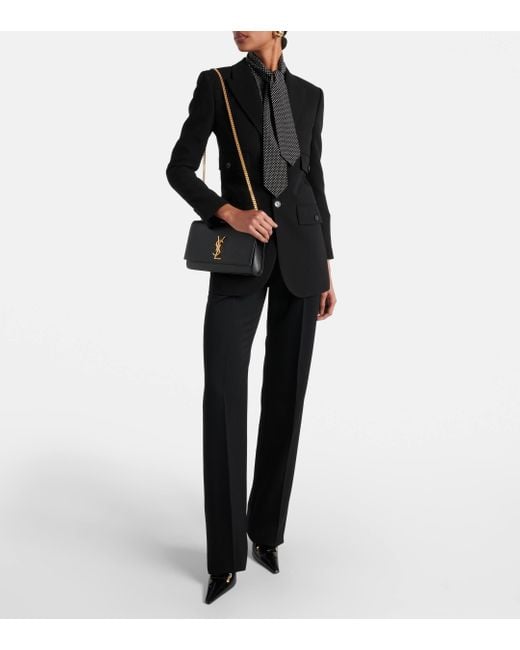 Sac a bandouliere Kate Medium en cuir embosse Saint Laurent en coloris Black