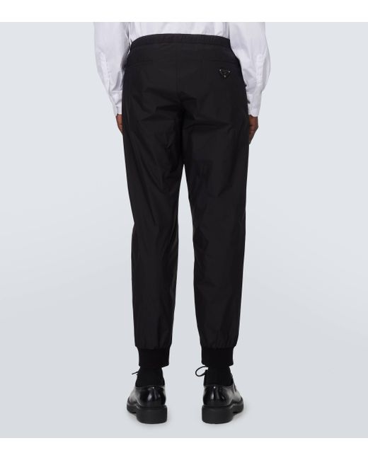 Pantalon de survetement en soie melangee Prada pour homme en coloris Black
