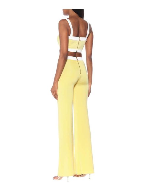 Pantalones Flared De Punto Tiro Alto Balmain de color Yellow