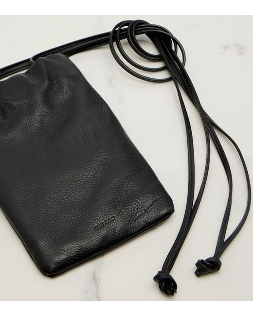 The Row Black Bourse Leather Phone Pouch