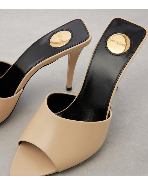 Mules Romy 90 di Saint Laurent in Metallic