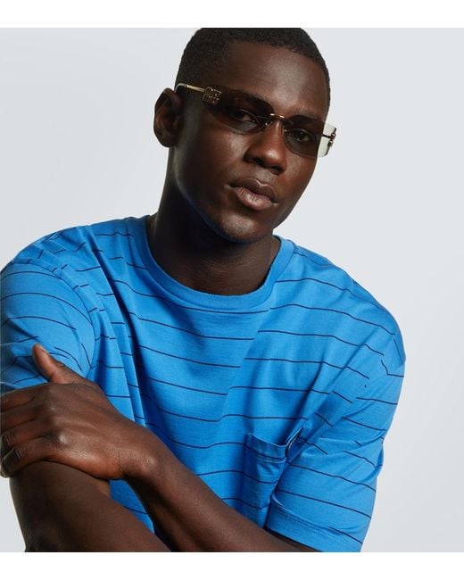 Miu Miu Metallic Logo Oval Sunglasses for men