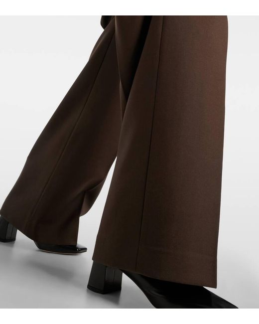 Pantalones Rectos De Lana Virgen AMI de color Black