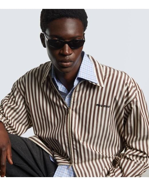 Miu Miu Ovale Sonnenbrille in Gray für Herren