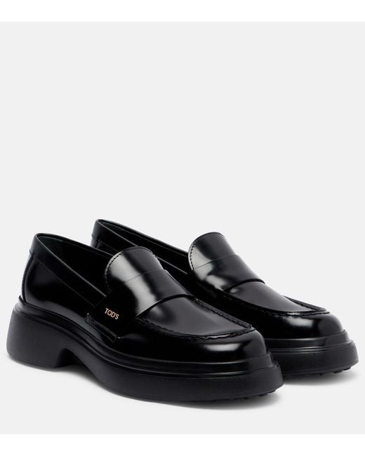Tod's Black Leather Loafers