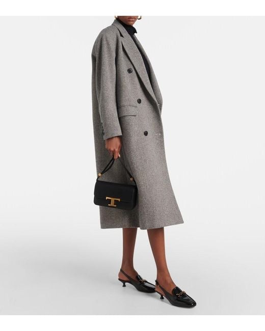 Tod's Black 35 Leather Slingback Pumps