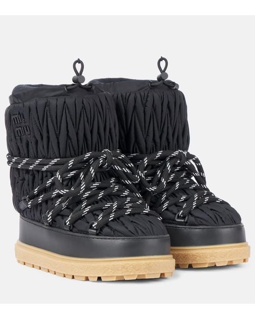 Botas De Nieve En Matelasse Con Logo Miu Miu de color Black