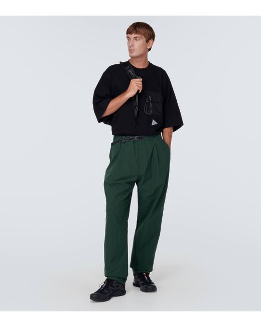 And Wander Green Nylon Chino Tuck Tapered Pants for men