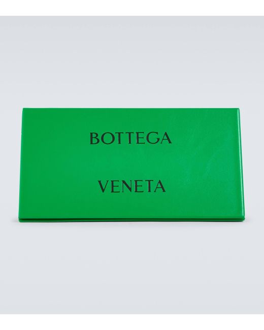 Lunettes de soleil rondes Bottega Veneta pour homme en coloris Blue