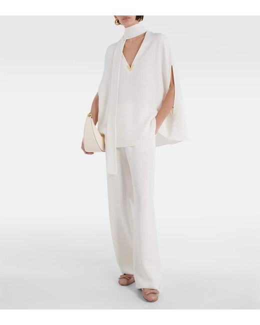 Blusa de seda con lazada y capa Valentino de color White