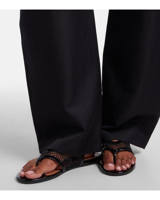 Alaïa Black Leather-Trimmed Fishnet Thong Sandals
