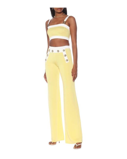 Pantalones Flared De Punto Tiro Alto Balmain de color Yellow