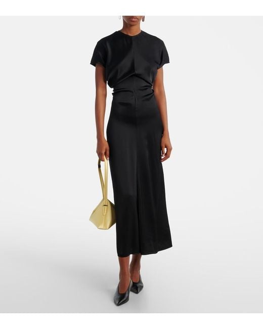 Totême Black Leather Pumps