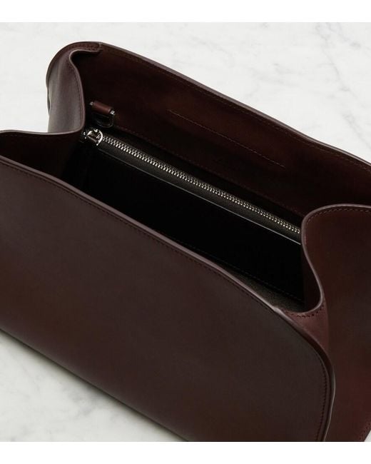 The Row Brown Peggy Medium Leather Clutch