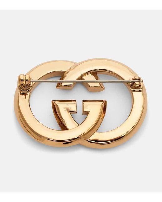 Broche Interlocking G A Ornements Gucci en coloris Metallic