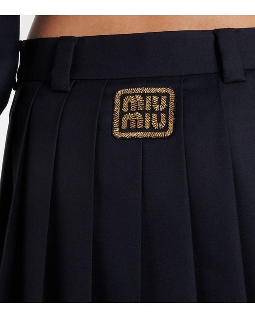 Minifalda de lana virgen plisada Miu Miu de color Black