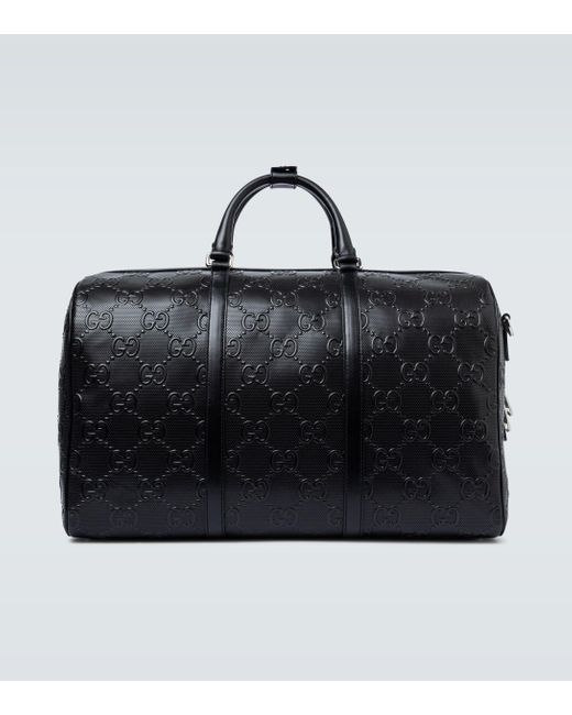 Gucci Black GG Embossed Duffle Bag for men