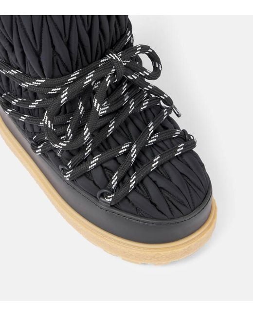Botas De Nieve En Matelasse Con Logo Miu Miu de color Black