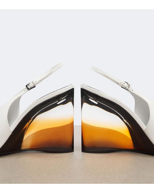 Alaïa White Invisible Leather Wedge Pumps