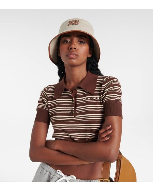 Miu Miu Beige Canvas Bucket Hat with Embroidered Logo Miu Miu Woven Bucket Hat - Beige/Cognac | Editorialist main image 4