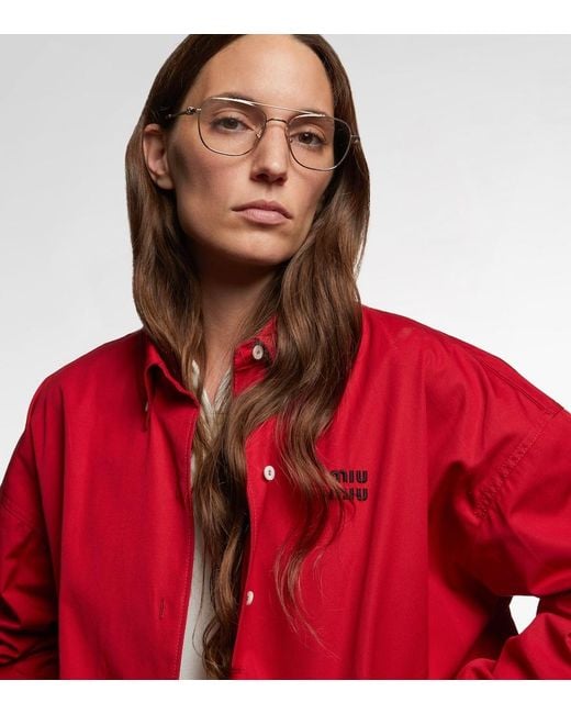 Miu Miu Metallic Aviator Glasses