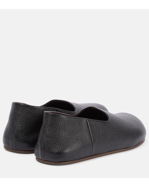 The Row Black Hugh Leather Slip-On Shoes