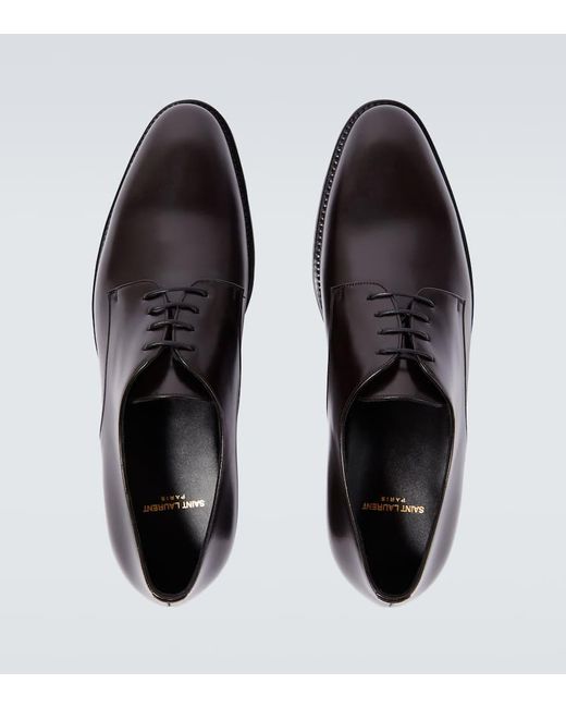 Zapatos derby Adrien de piel Saint Laurent de hombre de color Black